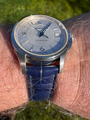 Customer review photo of a blue crocodile leather watch strap