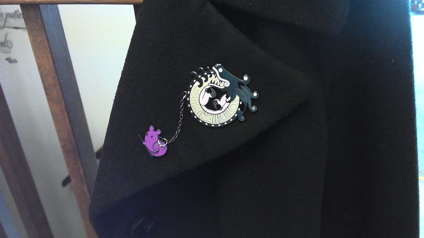 Customer photo review of Rain World - White Lizard Hanger Pin