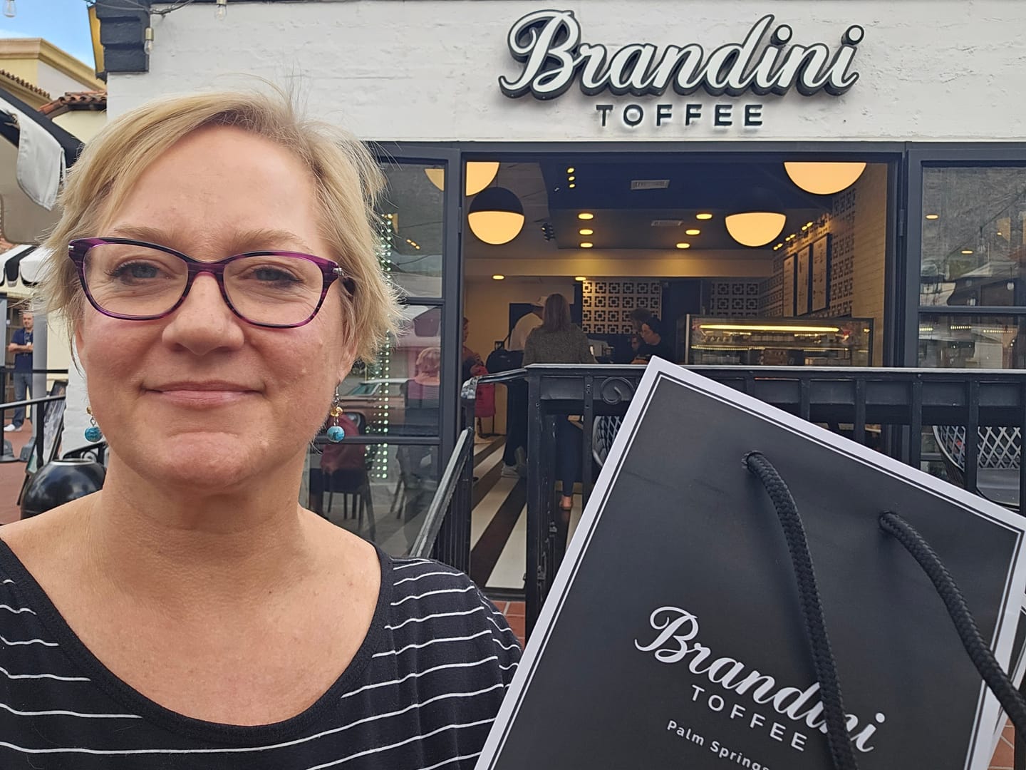 Customer photo review of 1/2 LB Tin Almond Toffee Bites