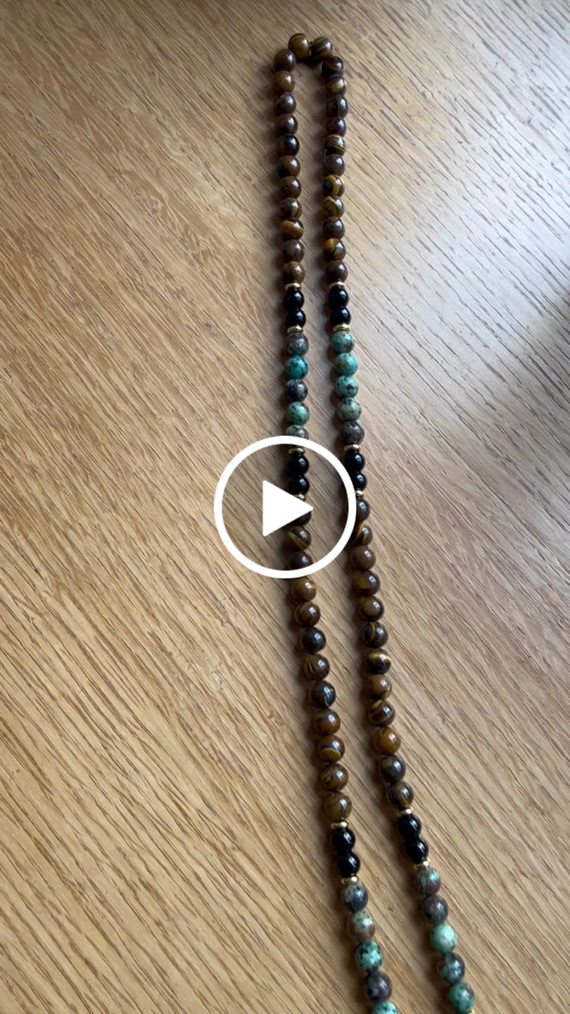 Customer video review of Buddha Stones 108 Mala Natural Stone Tiger Eye Turquoise  Beads Tassel Protection Bracelet
