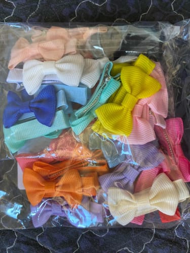 Customer photo review of 30 colored random bow fabric hair clips suitable for daily use as hair accessories