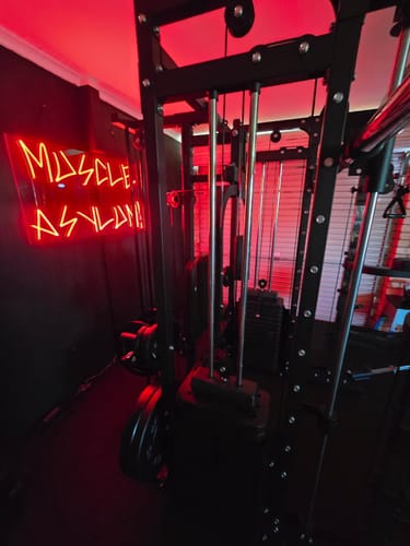 Customer photo review of Custom neon sign Muscle Asylum!