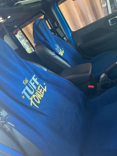 Customer's two blue Waterproof Car Towel Seat Covers on the front seats of a matching blue Jeep Gladiator.