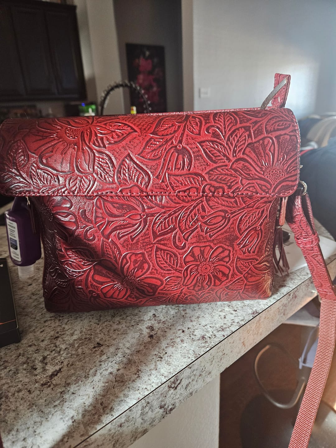 Customer photo review of Tooled American Cowhide Leather Clutch Purse with Built in Wallet