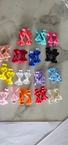Customer photo review of 30 colored random bow fabric hair clips suitable for daily use as hair accessories