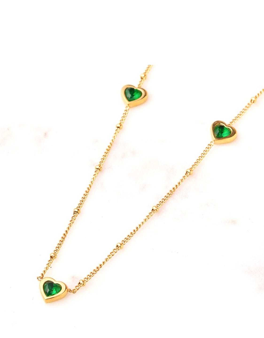 Customer photo review of Emerald Glow Heart Necklace