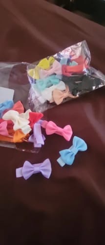 Customer photo review of 30 colored random bow fabric hair clips suitable for daily use as hair accessories