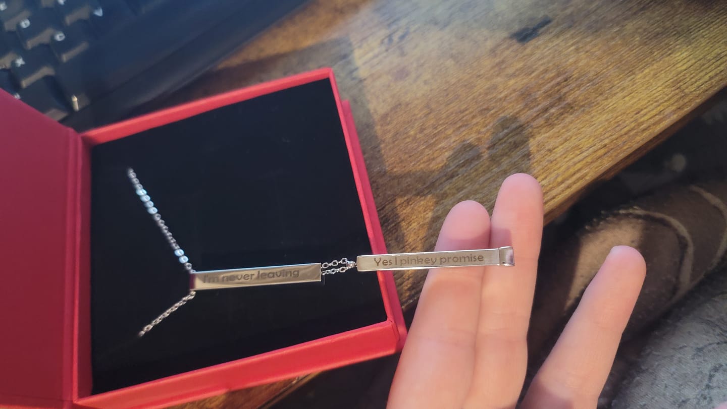 Customer photo review of Custom Text Engraved Secret Message Necklace