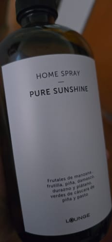 Reseña con foto de un cliente sobre Home Spray