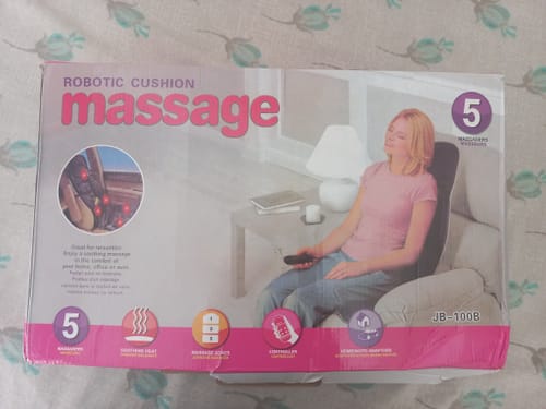 Customer's photo of the packaging for the Lot Imported 2-in-1 Seat Massager, showing product features.