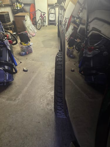 Reviewer's side view of their truck, showing the wider stance from the 2-inch wheel spacers.