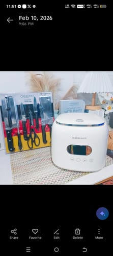 Customer's white Eurohauz Healthy Rice Cooker and the free knife set in its packaging, placed on a table.
