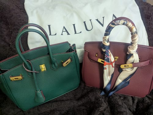 Customer's green and burgundy Warkin Bags in pebbled leather. The burgundy one has a scarf on the handle.