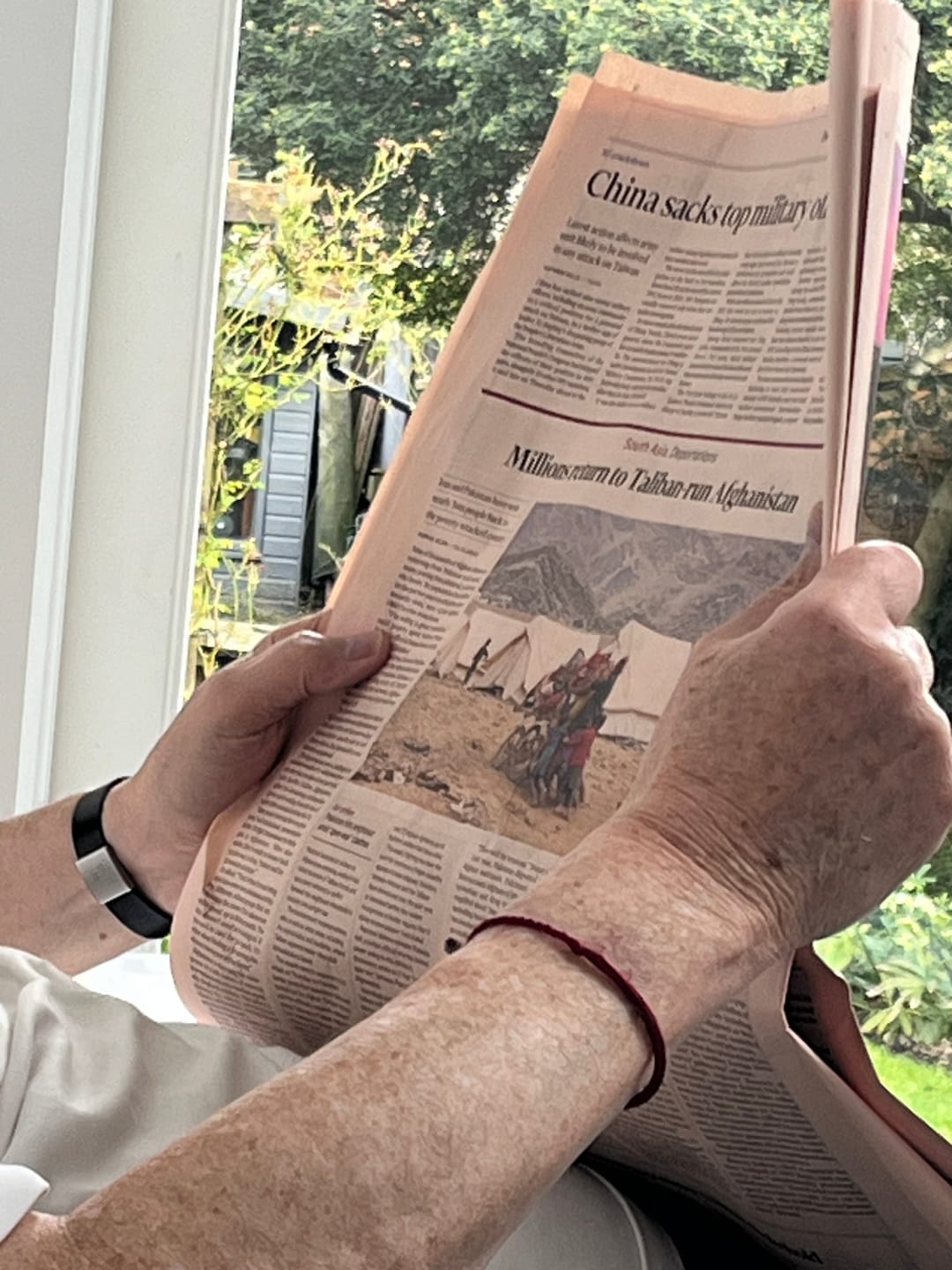 Customer photo review of Buddha Stones Red String Jade Connection Bracelet