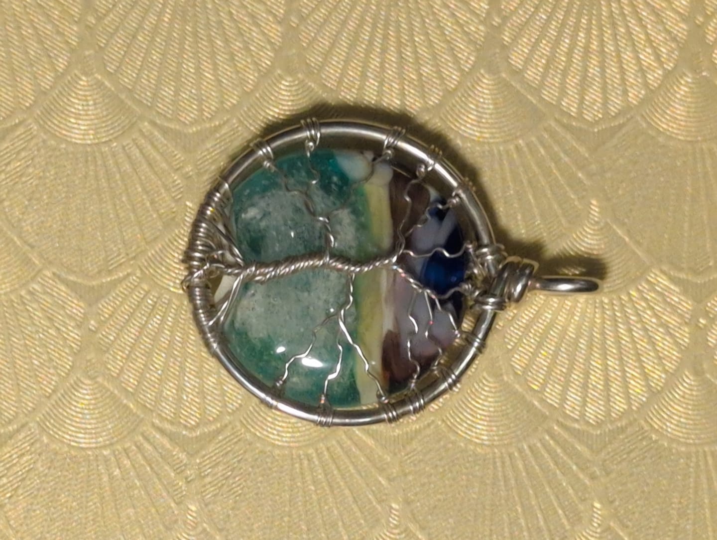 Customer photo review of Ocean Beach Sunset Tree of Life Cremation Pendant