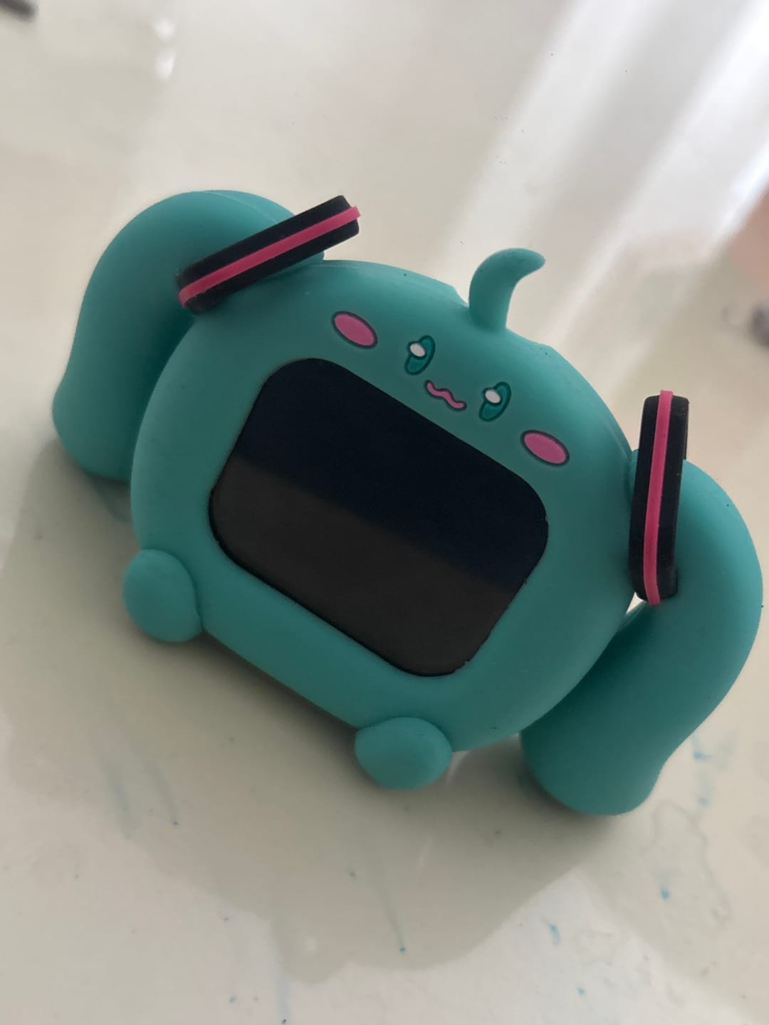 Customer photo review of Officially Licensed Hatsune Miku Wireless Earphones with Smart Display Desktop Stand