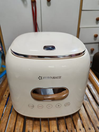 Customer's modern, cream-colored Eurohauz Healthy Rice Cooker on a bamboo surface.