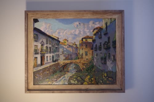 Customer's finished 'Darro River' paint by numbers artwork, displayed in a wooden frame on a wall.