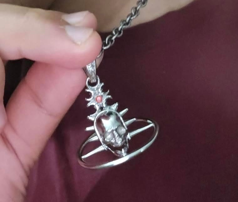 Customer photo review of ORBITUARY PENDANT