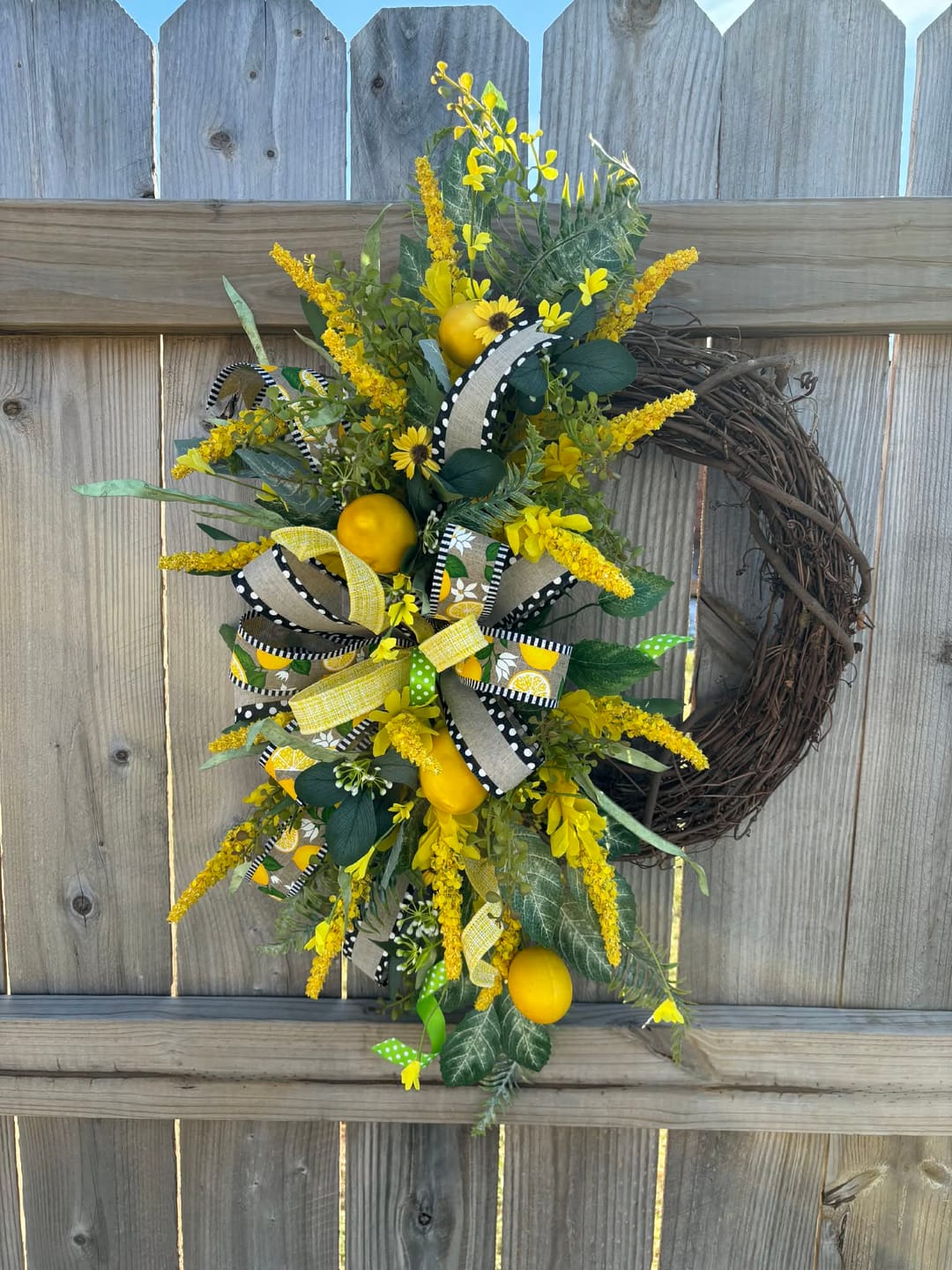 Customer photo review of 14" Oval Grapevine Wreath - DECOE-033