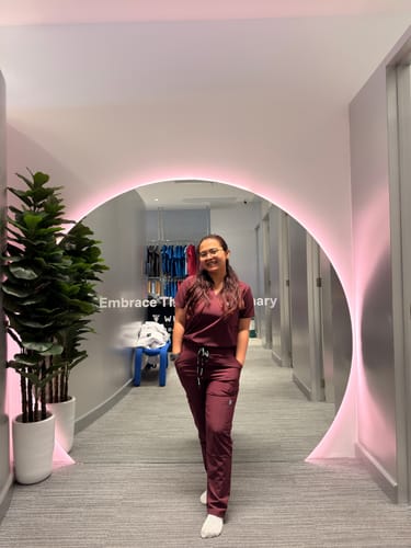 Customer photo review of 4-Pocket MoveTech® Scrub Top - Women / Merlot