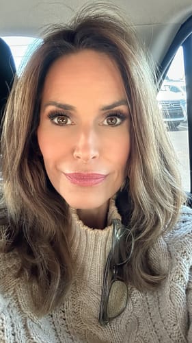 A reviewer's selfie showing the long, full look of her Fluffy® Gossamer® Lashes.