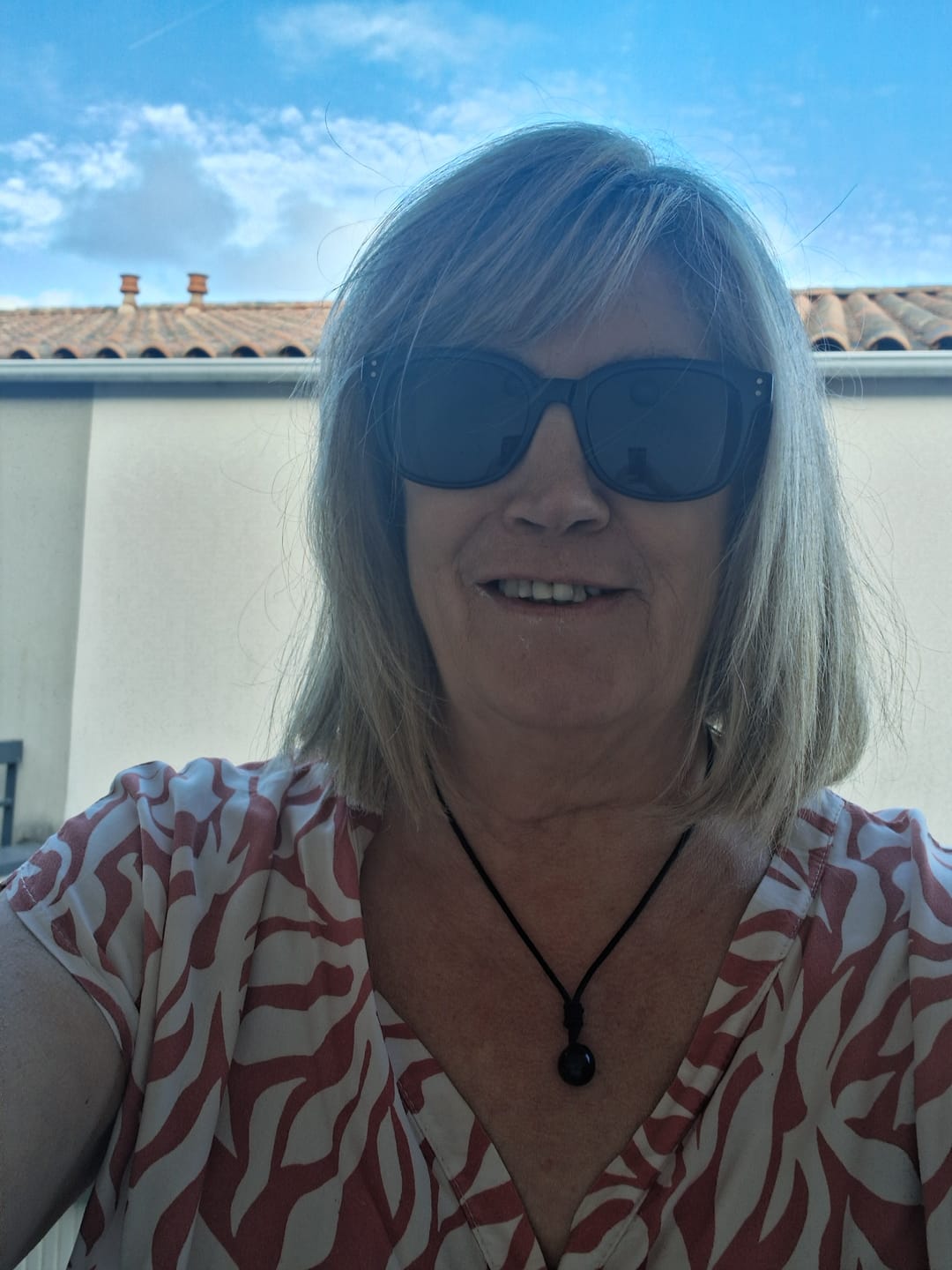Customer photo review of Pendentif "Sphère" en Obsidienne Dorée
