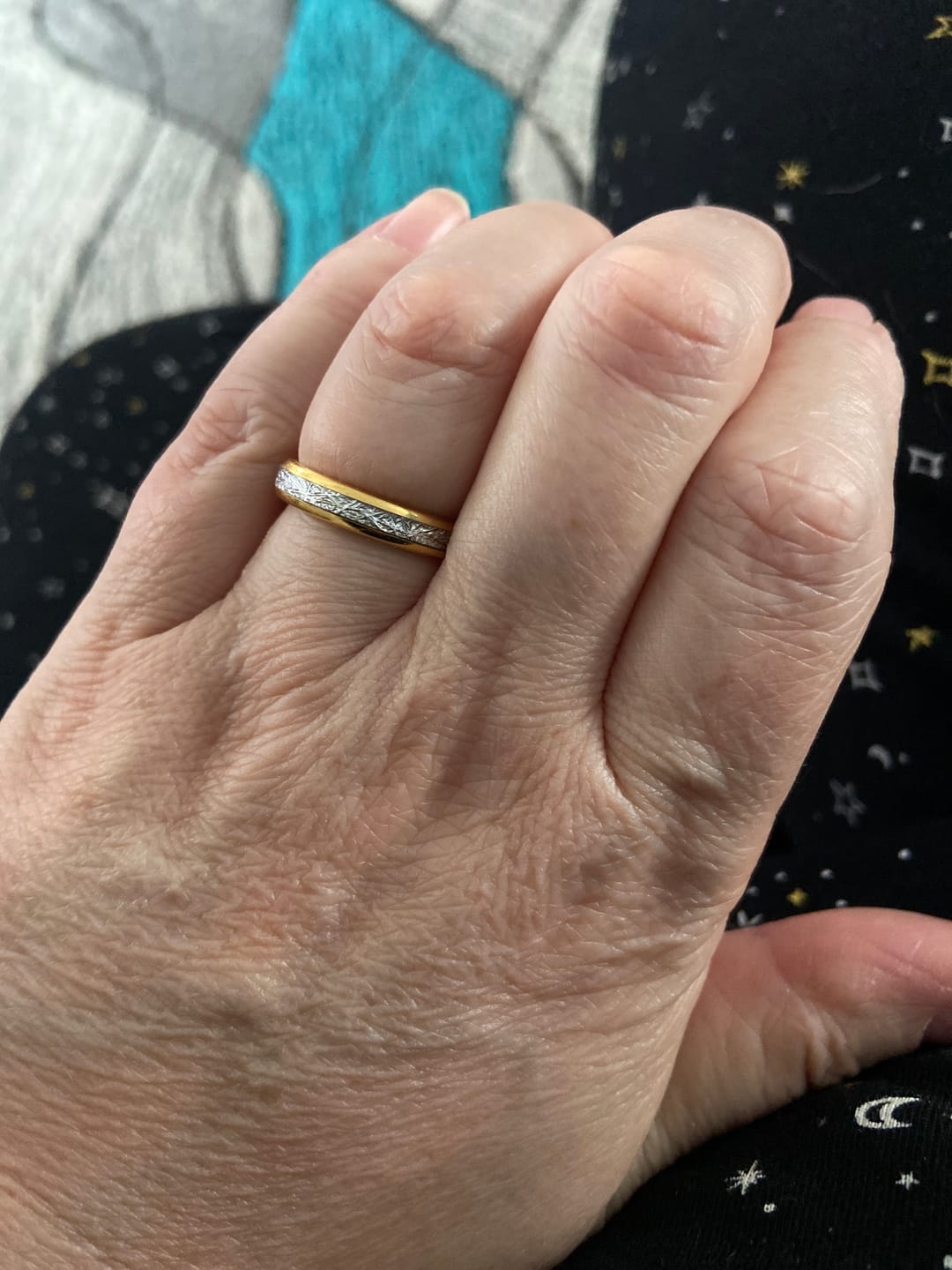 Customer photo review of The Golden Steel 4mm Wonder Ring
