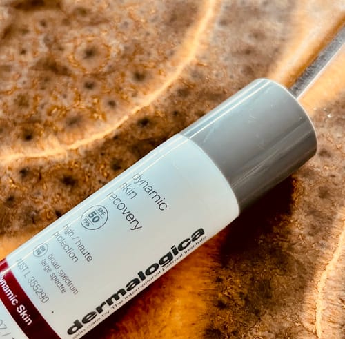 Customer's close-up of the dynamic skin recovery moisturiser bottle, showing the SPF 50 label.