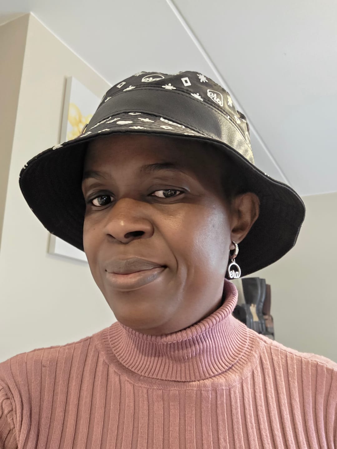 Customer photo review of Silver Precious Logo Earrings