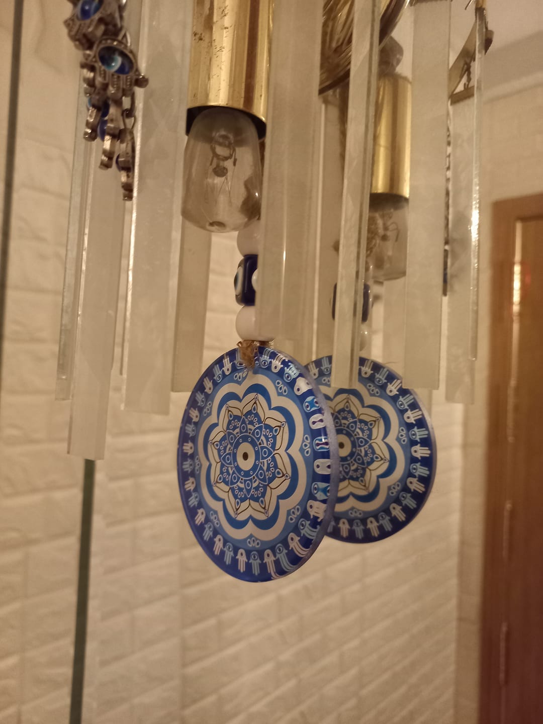 Customer photo review of Amuleto Ojo Turco con Mandala - Cristal || Protección Energética para tu hogar