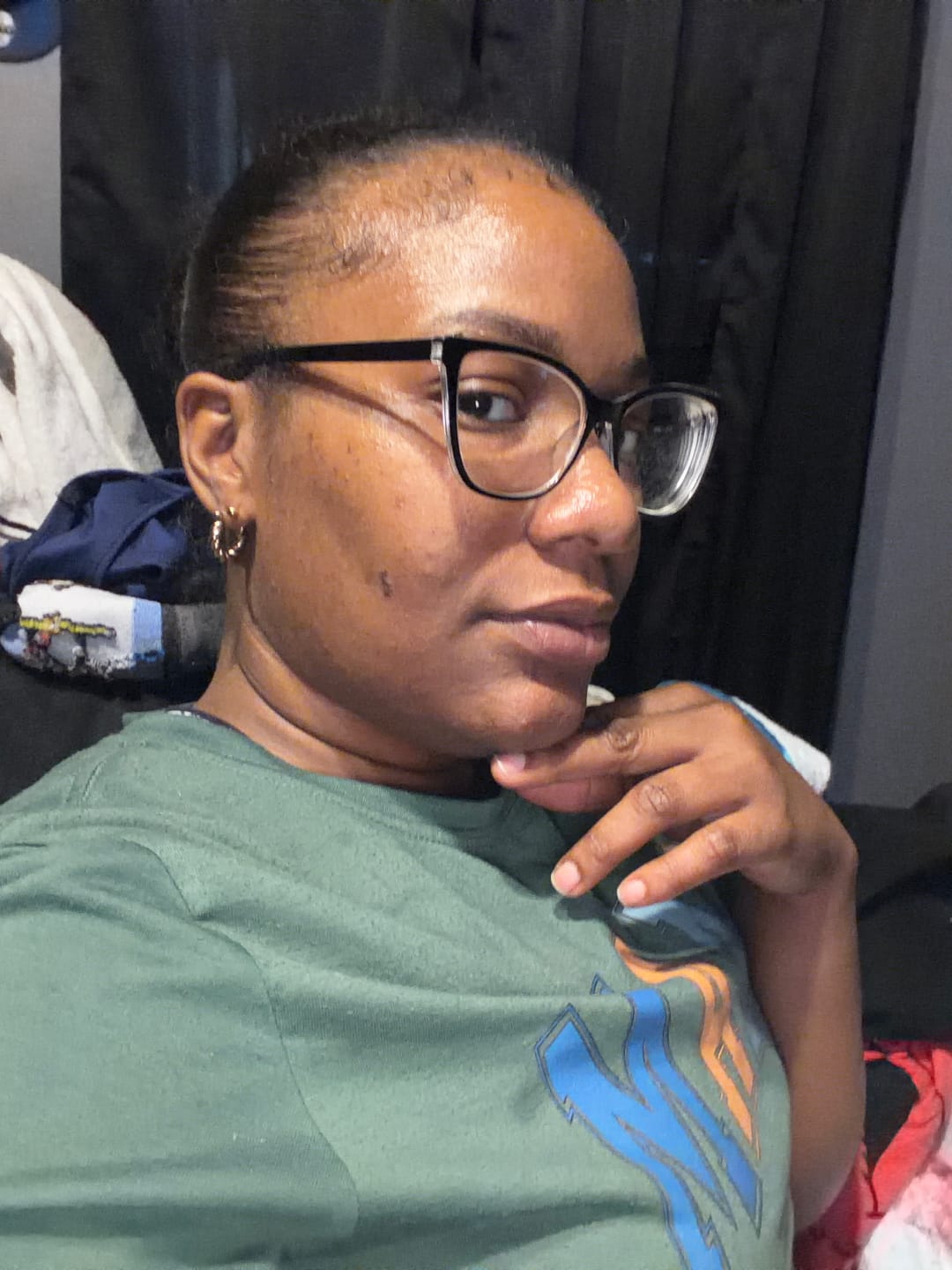Customer photo review of Twist Hoop Earrings