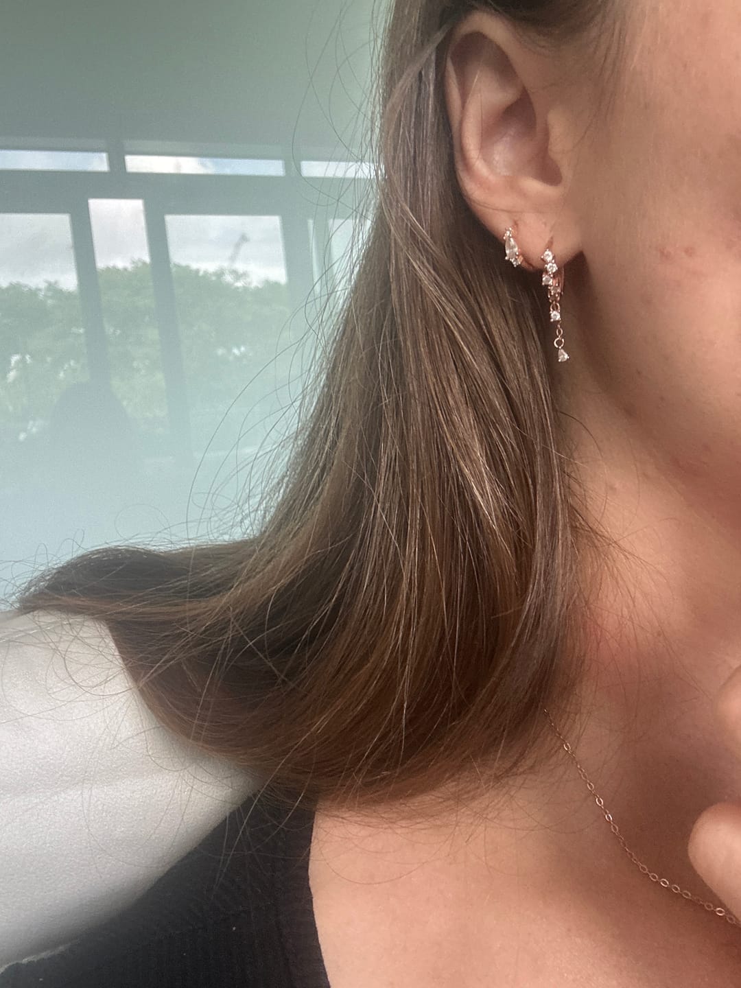 Customer photo review of Aura Sapphire Huggie Earrings