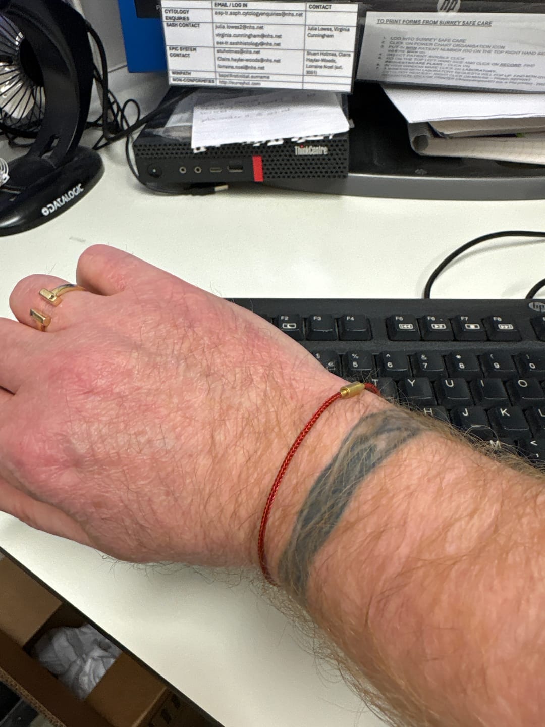 Customer photo review of Protective Red Cord Gold Bracelet