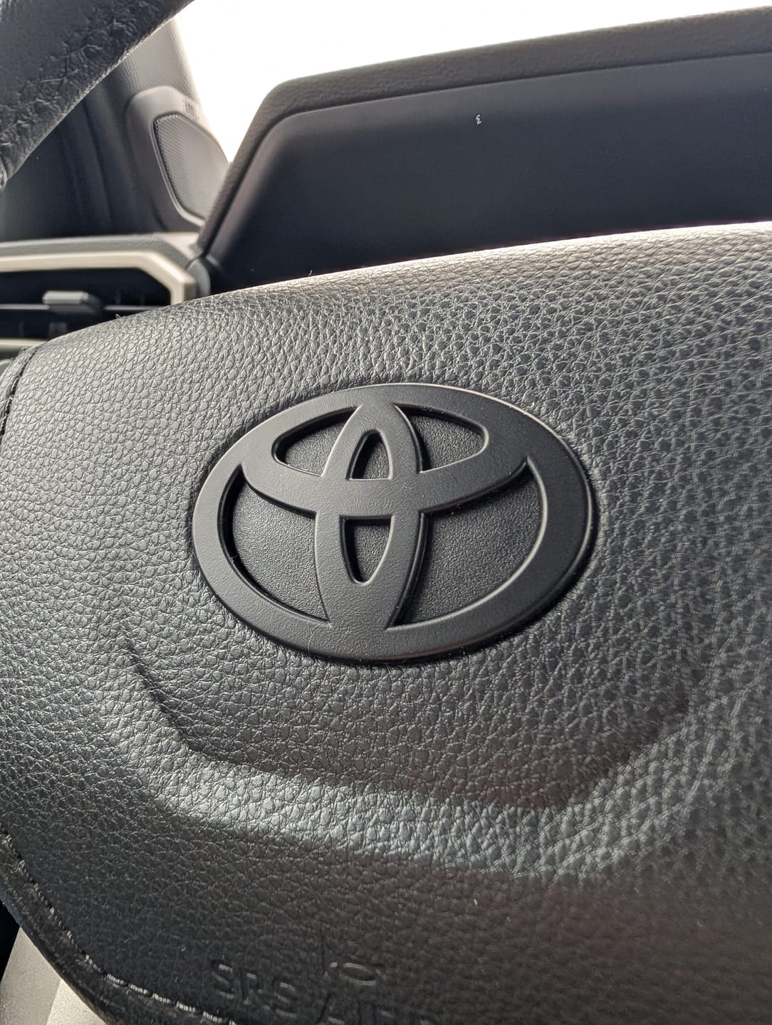 Customer photo review of NEW Black Matte Steering Wheel Emblem Fits NEW Models 2024-2026 Tacoma, 4Runner & Camry