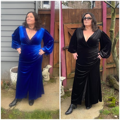Reviewer showing the Film Noir Gown in blue (XL) and black (2X) for size comparison.