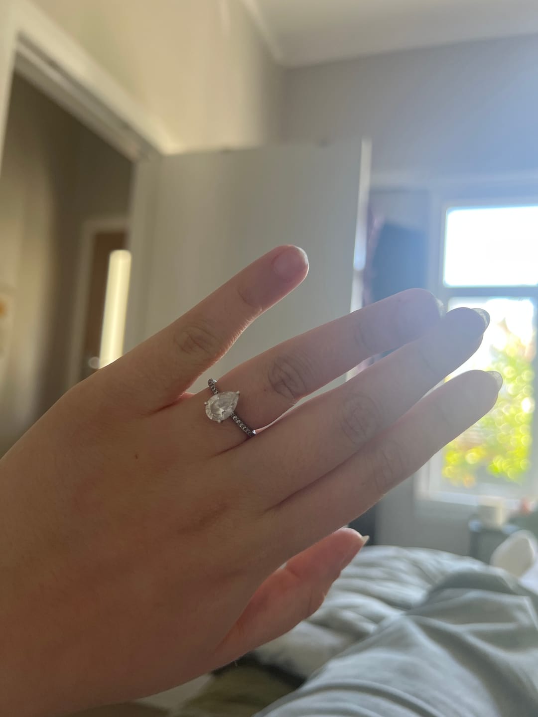 Customer photo review of The Anna Pear Sapphire Engagement Ring