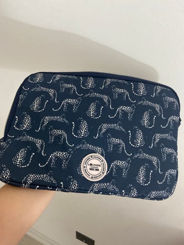 Reseña con foto de un cliente sobre Funda Notebook Tigres