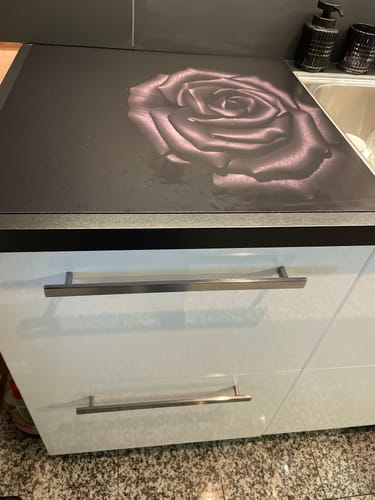 Customer photo review of Inductiebeschermer - Bloemen - Roos - Zwart