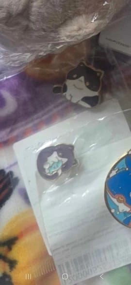Customer photo review of Cute Tiny Cat Enamel Pins