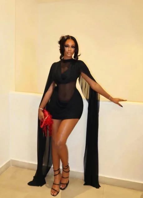 Customer photo review of Stacey Sheer Mini Dress with Cape Sleeves
