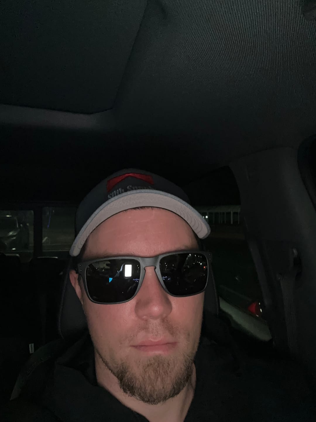 Customer photo review of Stlth Supply Embroidered Trucker Cap