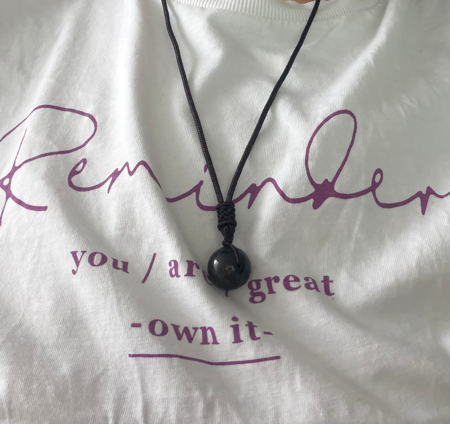 Customer photo review of Pendentif "Sphère" en Obsidienne Dorée