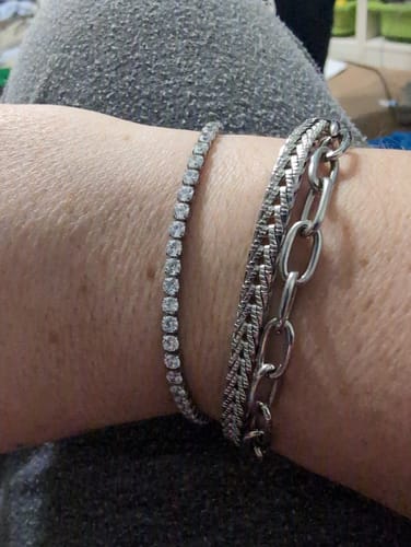 Reviewer shares a close-up of their wrist, wearing the sparkling Diamond Tennis Bracelet next to another silver bracelet.