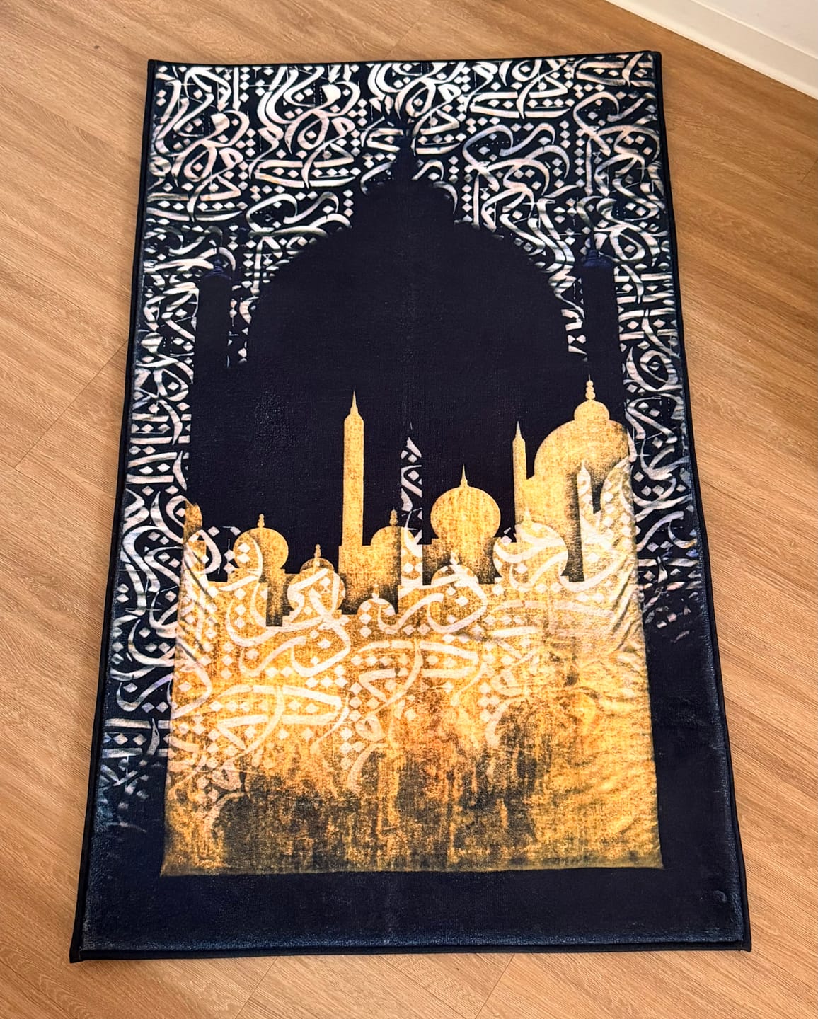 Customer photo review of Dark Arabic Calligraphy  Padded Prayer Mat