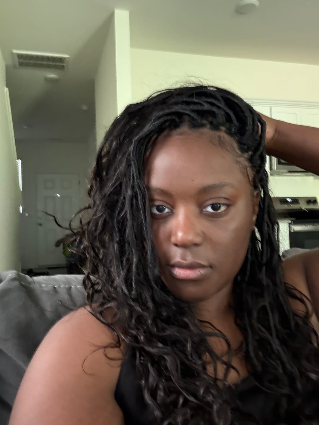 Customer photo review of Pre-looped Crochet Boho Locs with Body Wave Virgin Human Hair Curls