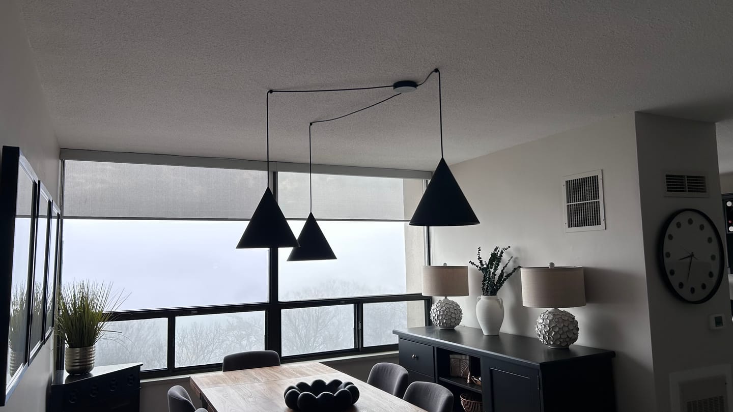 Customer photo review of CONO Black Modern Minimalist Suspension Pendant Ceiling Light Fixture for Kitchen Island, Dining Room & Living Room (3-Light)