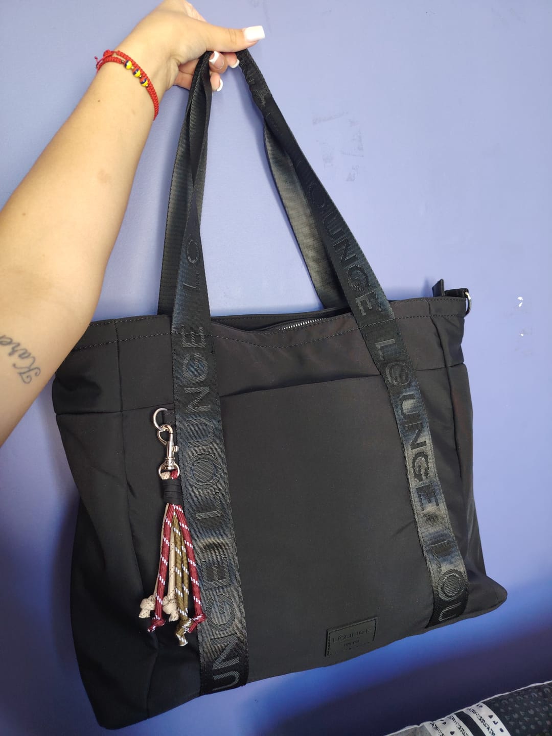 Customer photo review of Bolso Nylon Llavero Street