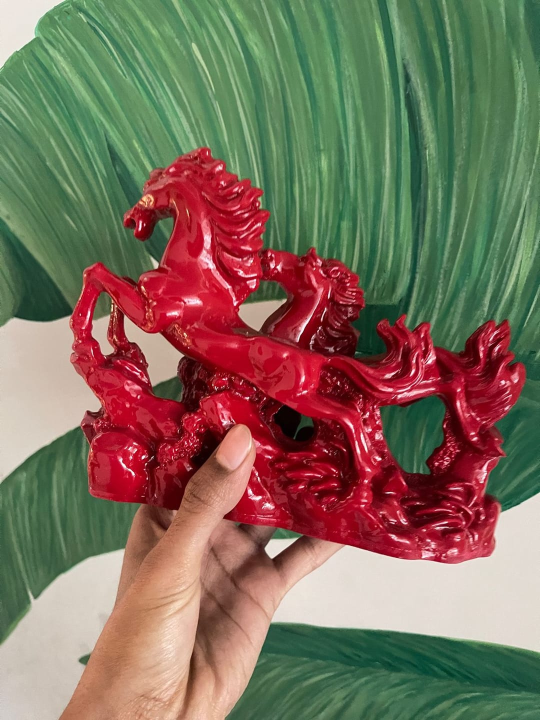 Customer photo review of Dynamic Red Running Horses Resin Sculpture Vastu Remedy for Speed, Success and Career Momentum for Office Desk, Business Spaces and Home Decor | 21 x 16 cm | 550 gm