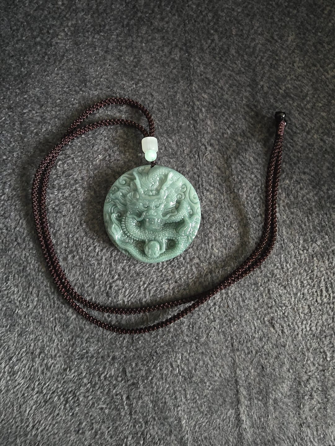 Customer photo review of Grade A Blue Jadeite Dragon Pendant – Bold Ice Variety Jade Necklace for Men